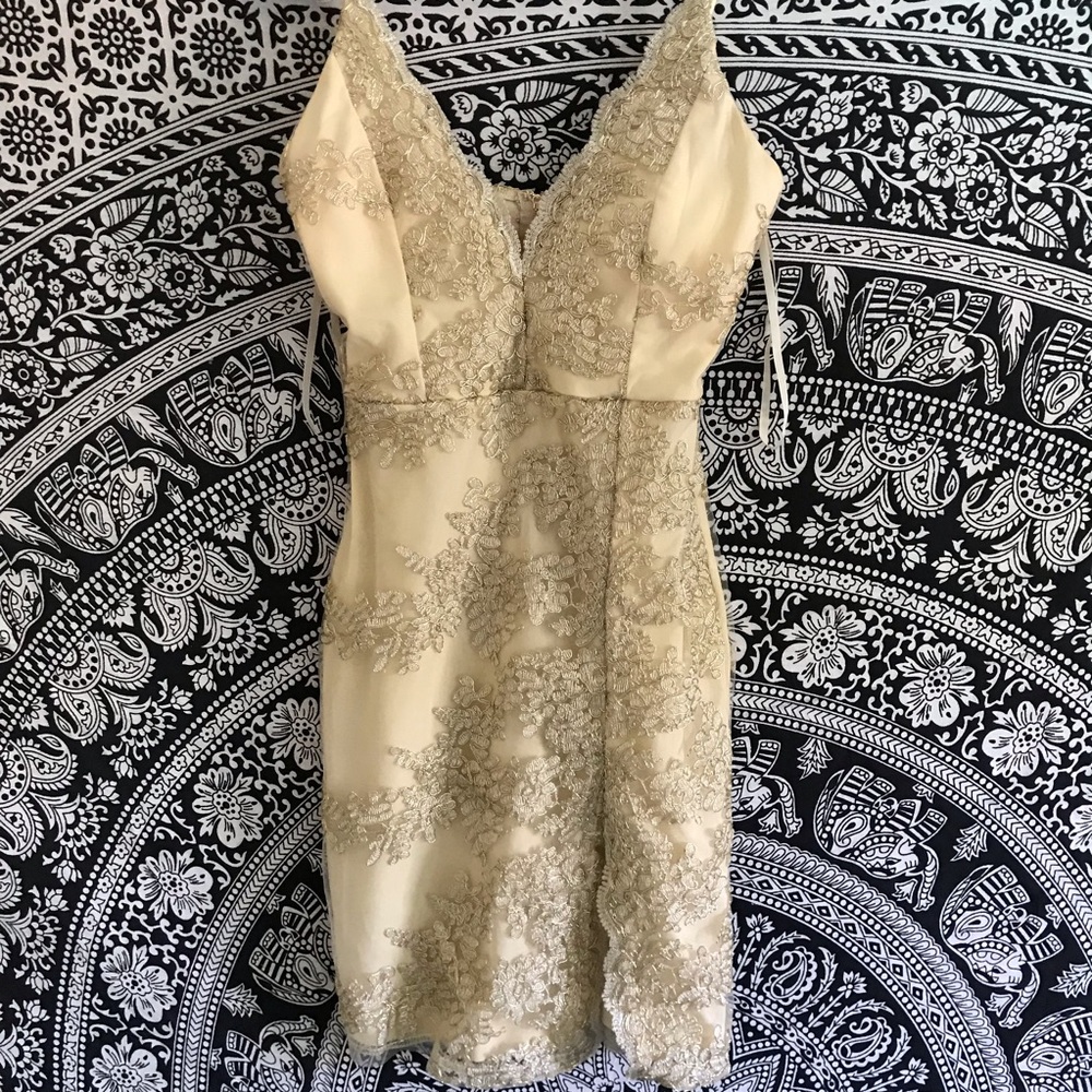 Gold bejeweled accented mini dress